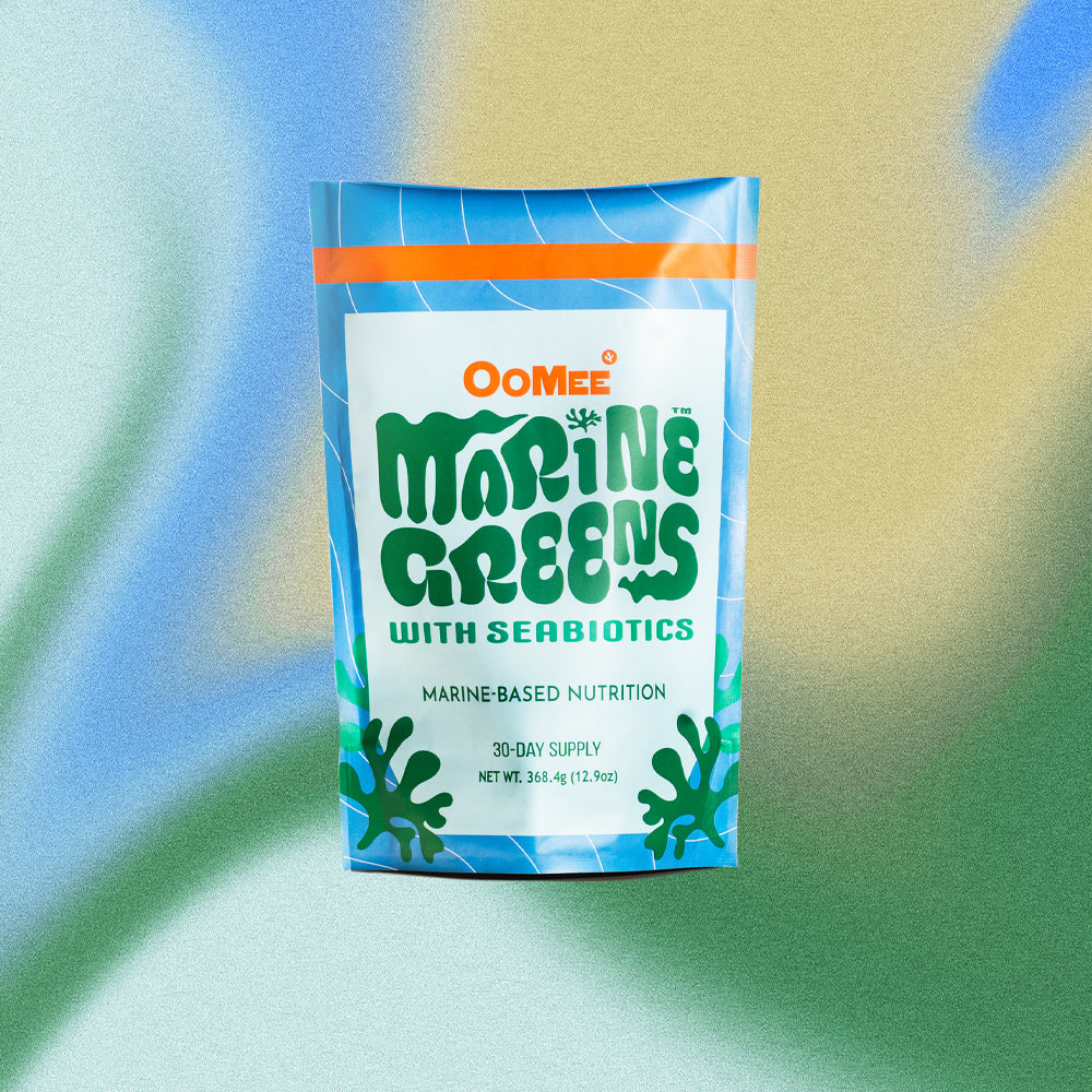 OoMee Marine Greens Powder – 30-Day Supply Stand-Up Pouch with Seabiotics™ Marine-Based Nutrition, in Front of a Vibrant Blue, Yellow, and Green Gradient Background.